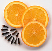 Three slices of orange and cloves