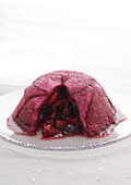 Summer pudding with slice cut out