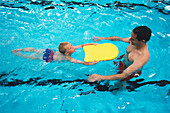Young boy swimming