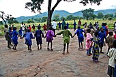 Children exercising in school yard