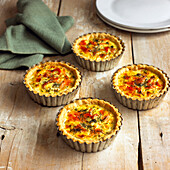 Smoked trout tartlets in silver tins