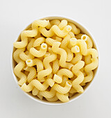 Bowl of cooked cavatappi pasta