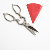 Scissors and red paper