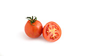 Whole and sliced English Tigerella tomato