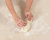 Shaping baguette dough using fingers