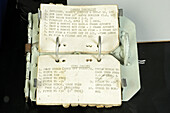 Checklist notepad for space flight in metal case