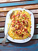 Sweet and smoky shrimp, bacon and grits