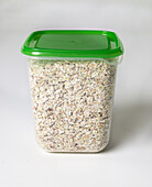 Gluten free oat bran in airtight plastic container