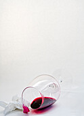 Spilt glass of red wine