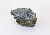 Fibrous crystals of riebeckite on rock groundmass