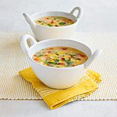 Bowls of cheese, red pepper and sweetcorn chowder