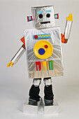 Child wearing robot costume