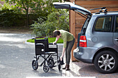 Unfolding a wheelchair