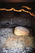 Rustic bread in a bread oven