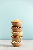 Rice, oat, almond, hazelnut and soy beans in natural bowls