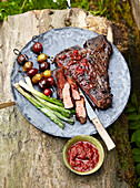 T-bone steak with tomato dip