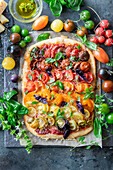 Tomato flatbread with rainbow tomatoes arrangement