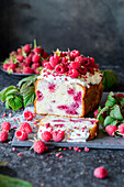 loaf cake with raspberries and cream