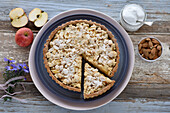 Vegan apple tart with frangipani cream and almond sprinkles