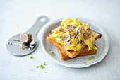 Scrambled eggs on toast with white truffle (vegetarian)