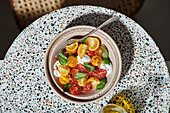 Colorful tomato and mozzarella salad with basil