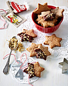 Star-shaped biscuits with chocolate icing