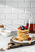 Pancakes with berries and honey