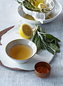 Thyme sage tea with ginger, turmeric and lemon