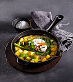 Vegetable soup with poached egg