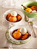 Tangerines in mulled wine with vanilla ice-cream