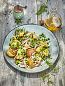 Summer potato salad with dill and peas