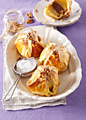 Baked apples with nuts in French pastry