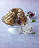 Cream fancy bread with poppy seed and plums