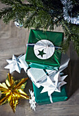 Christmas gifts wrapped in brown paper with name-tags