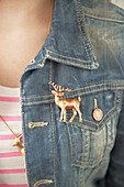 Reindeer brooch on a jean jacket