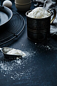 Icing sugar in a vintage colander