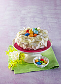 An Easter wreath cake with coconut cream