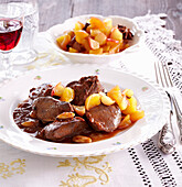 Goose liver prepared on red wine with apples