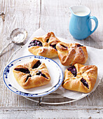 Leavened pastries with custard and blueberry filling