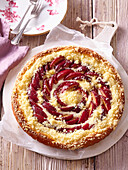 Red plum cake with crumb