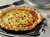 Ham and asparagus quiche with a classic pastry crust