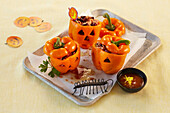 Spooky peppers with stuffing for Halloween