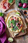 Pizza with_prosciutto and green peas