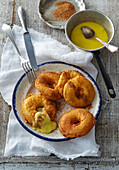 Fried apple rings with vanilla sauce