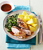 Pimento chicken breast with spinach and potatoes