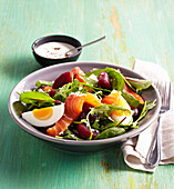 Salad with smoked salmon and egg