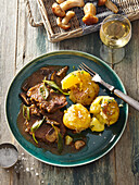 Beef stew with mushrooms and sage