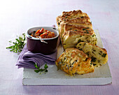 Homemade herb bread with tomato dip