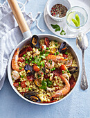 Paella with scallops and shrimps