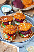 Sweet potato fritters with beetroot burger